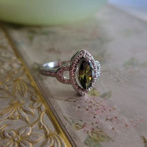 Green and silver ring